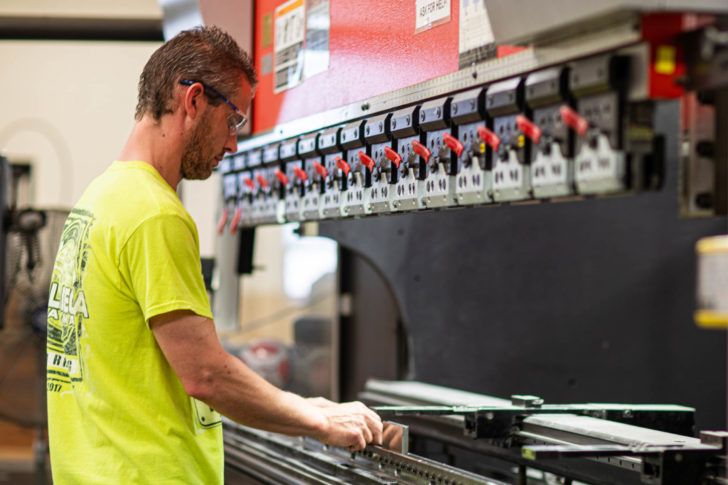 Dawson employee setting up a brake